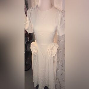 Elegant White Dress with Floral Accents